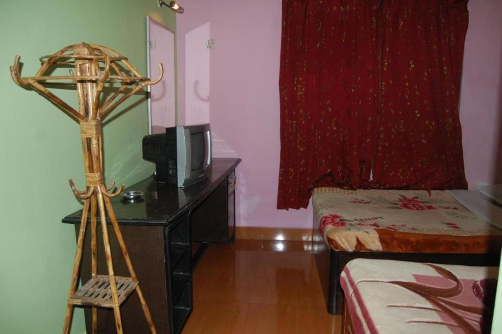 Postel nebo postele na pokoji v ubytování Siddhartha Guest House