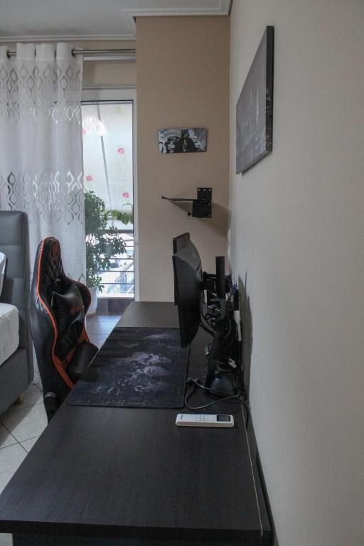 TV a/nebo společenská místnost v ubytování Premium Apartment In Chalkida
