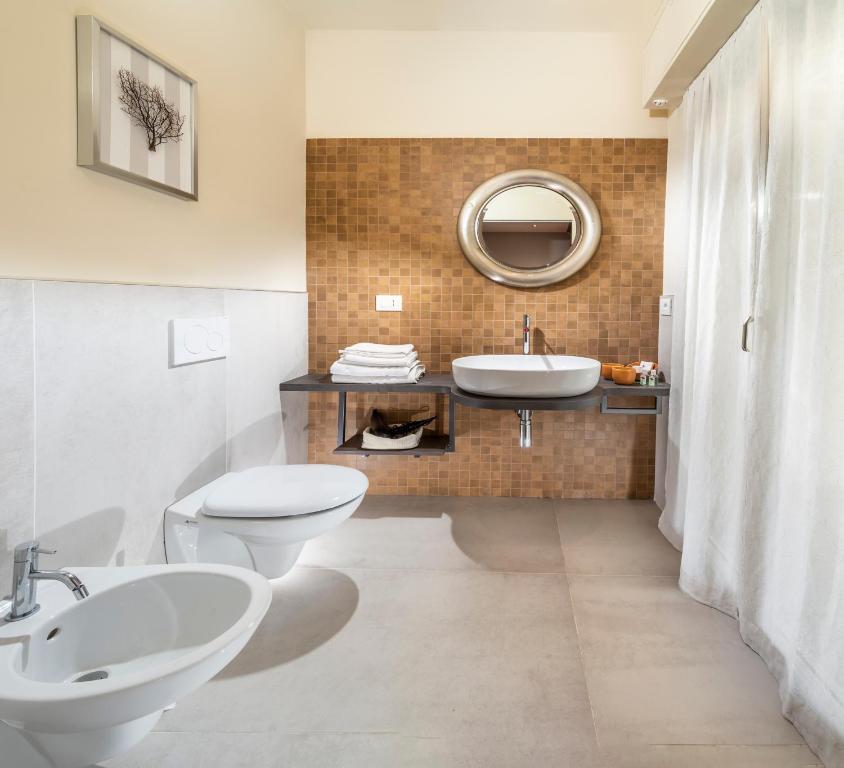 Koupelna v ubytování Hotel Alba