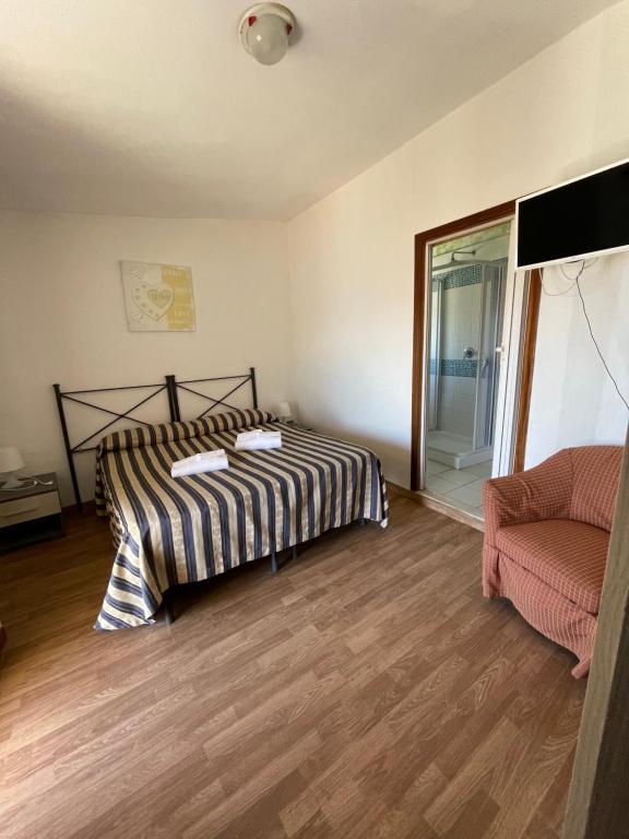 Postel nebo postele na pokoji v ubytování Hotel Eden