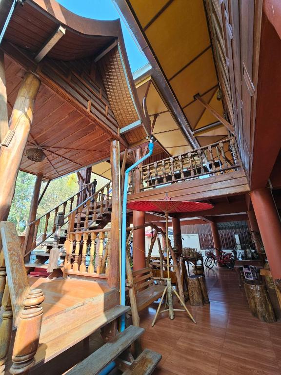 Fotografie z fotogalerie ubytování บ้านเรือนไทยมะลิเมืองเก่า v destinaci Sukhothai