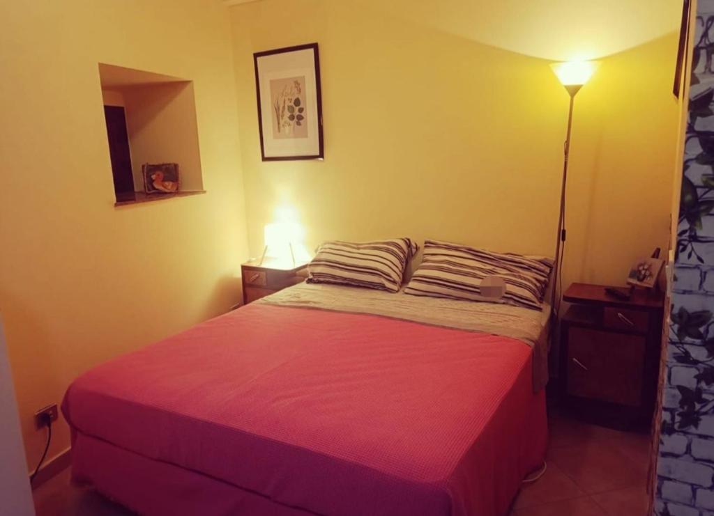 Ένα ή περισσότερα κρεβάτια σε δωμάτιο στο Casa vacanza BB degli angeli