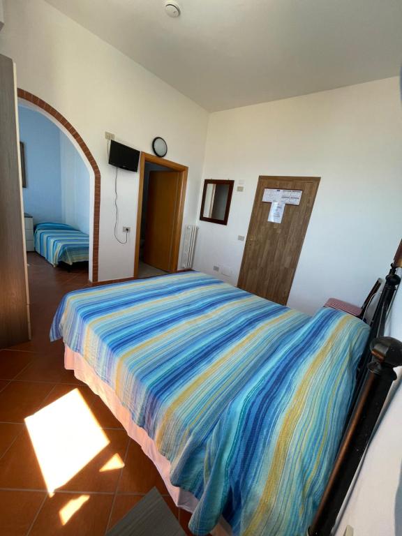 Postel nebo postele na pokoji v ubytování Hotel Eden
