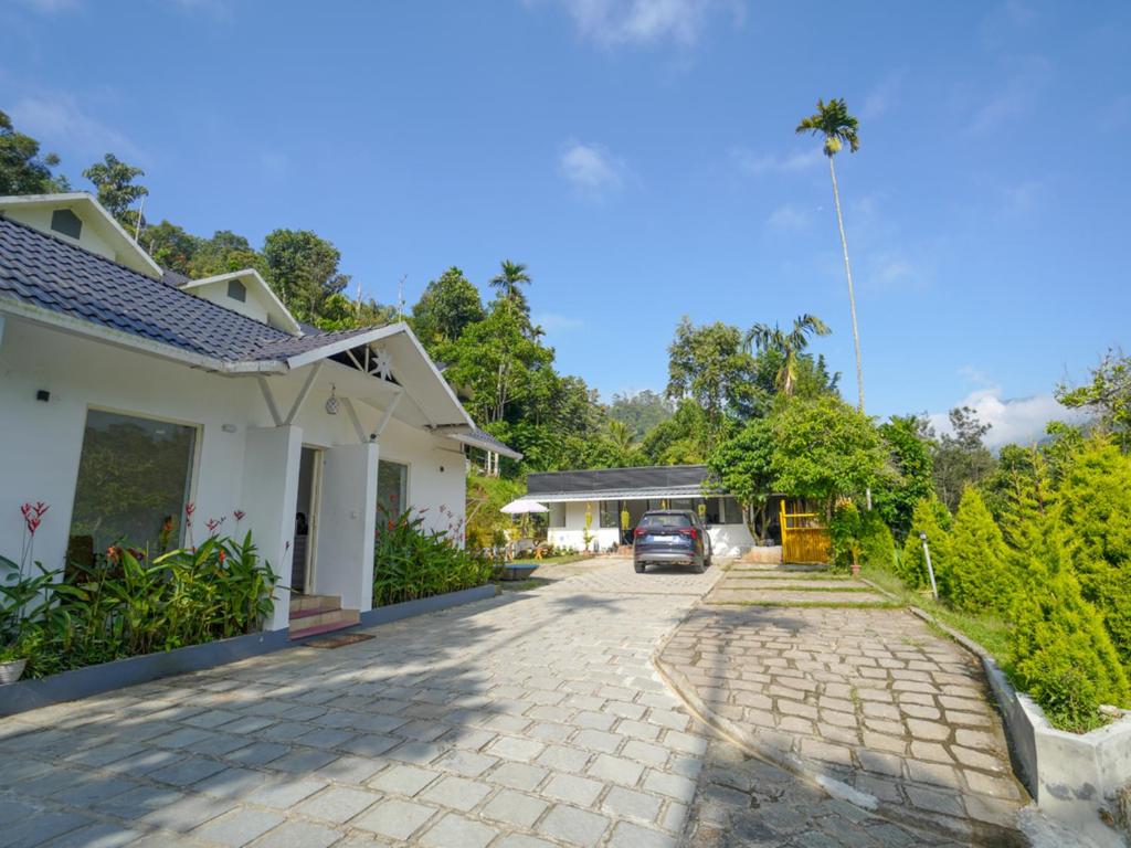 Zahrada ubytování Munnar Majestic Resort with Pool