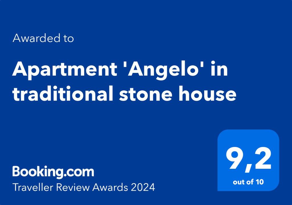 a blue sign with the words appointment angelo in a traditional stone house at Apartment 'Angelo' in traditional stone house in Slime