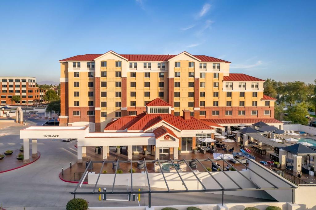 a rendering of a hotel with a large building at Hilton Garden Inn Scottsdale Old Town in Scottsdale