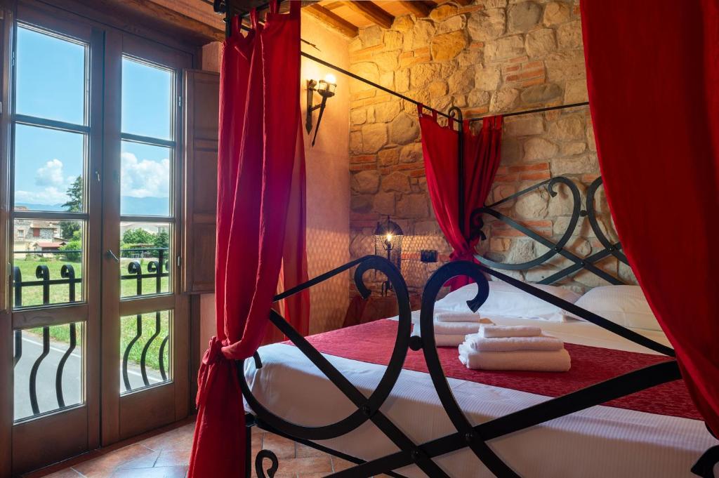 Postel nebo postele na pokoji v ubytování Castello dei Templari