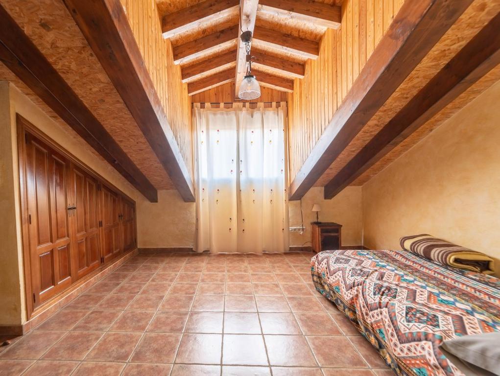Posteľ alebo postele v izbe v ubytovaní Casa Rural Castillo Diempures