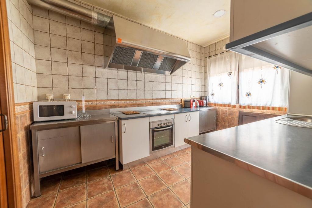 Kuchyňa alebo kuchynka v ubytovaní Casa Rural Castillo Diempures