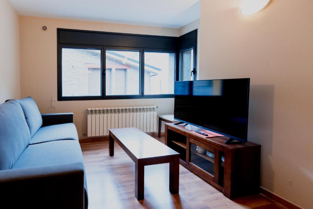 TV a/nebo společenská místnost v ubytování Pierre & Vacances La Merceria