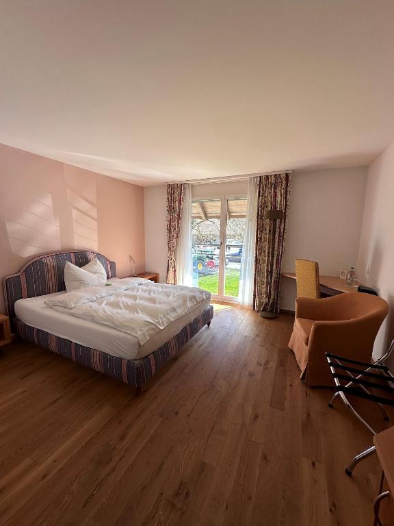Postel nebo postele na pokoji v ubytování Parkforum Wylihof