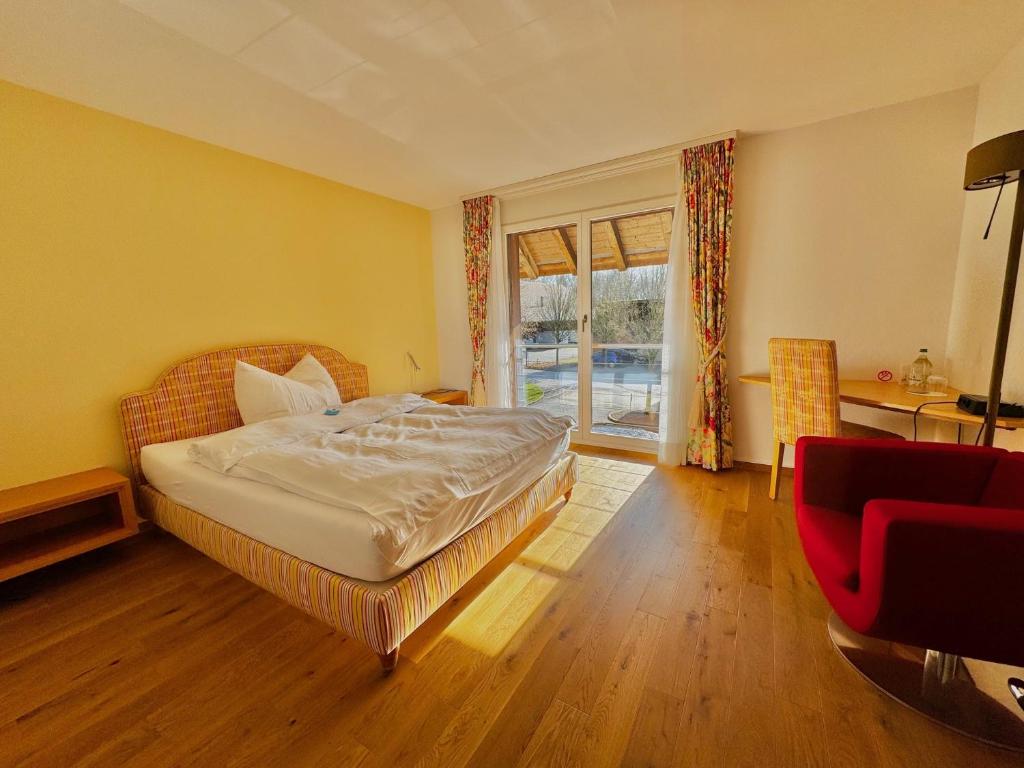 Postel nebo postele na pokoji v ubytování Parkforum Wylihof