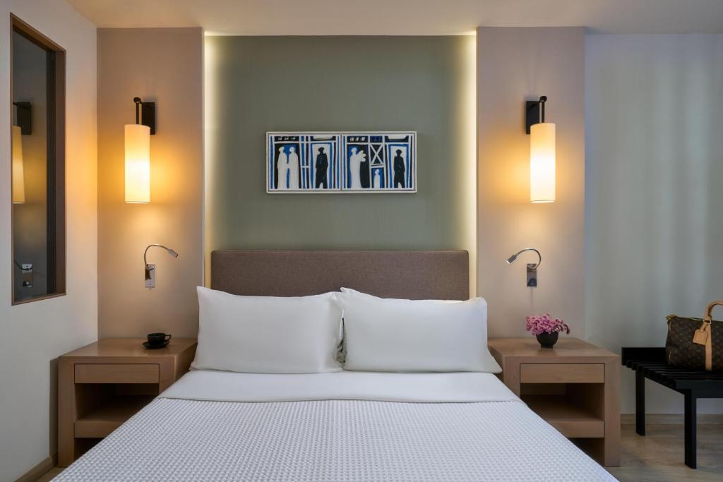 Кровать или кровати в номере White Rocks Hotel Kefalonia