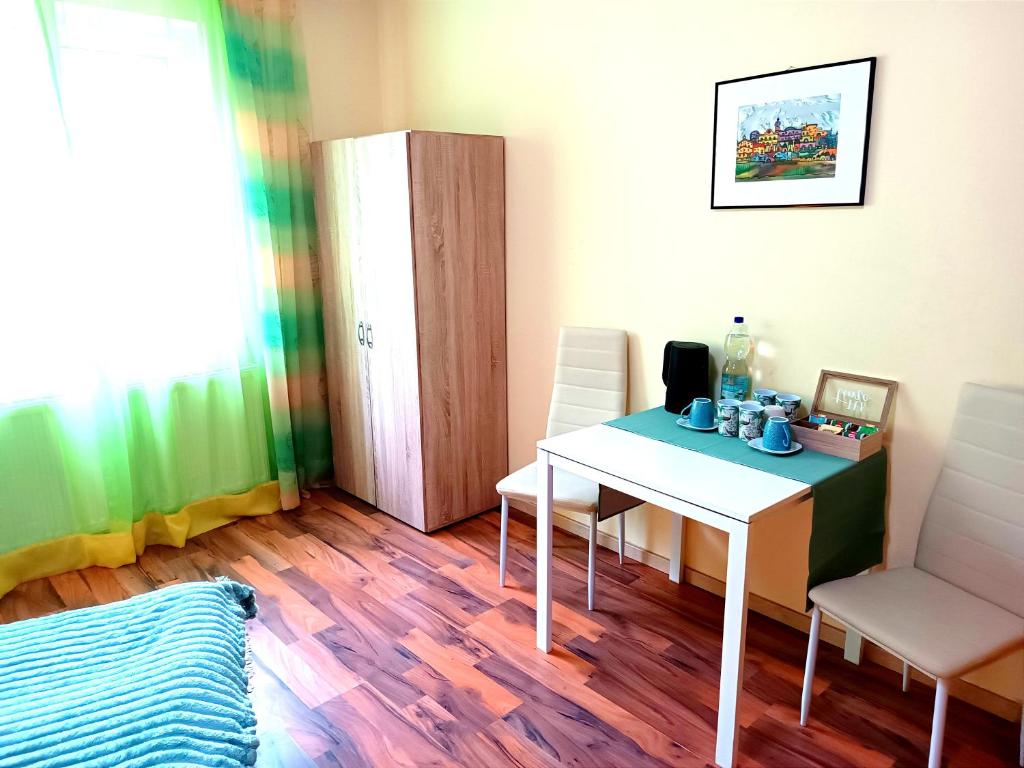 Postel nebo postele na pokoji v ubytování Hotel Zemlinski