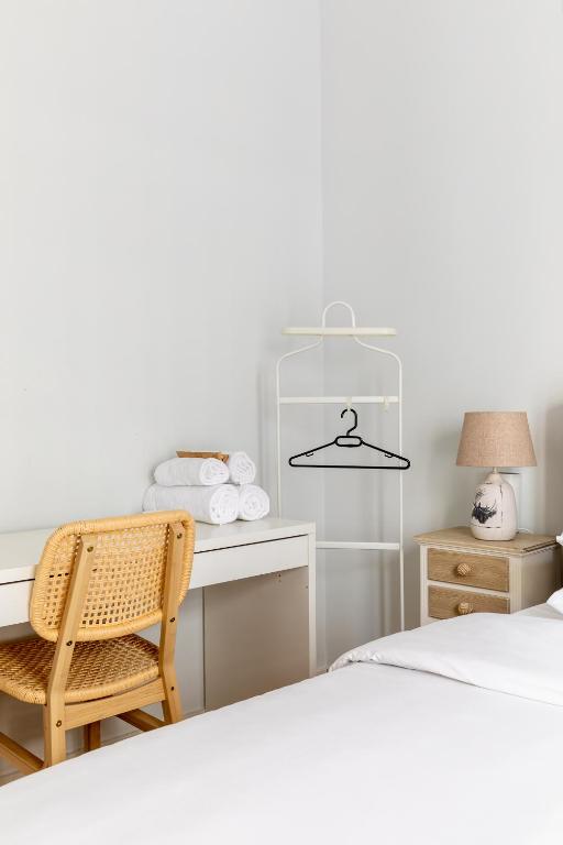 A bed or beds in a room at Eclair by halu! Apartments