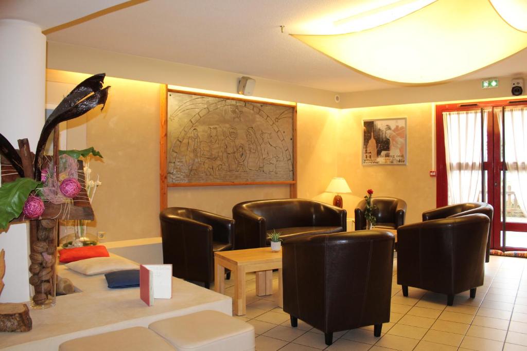 Posezení v ubytování Hôtel Mélodie