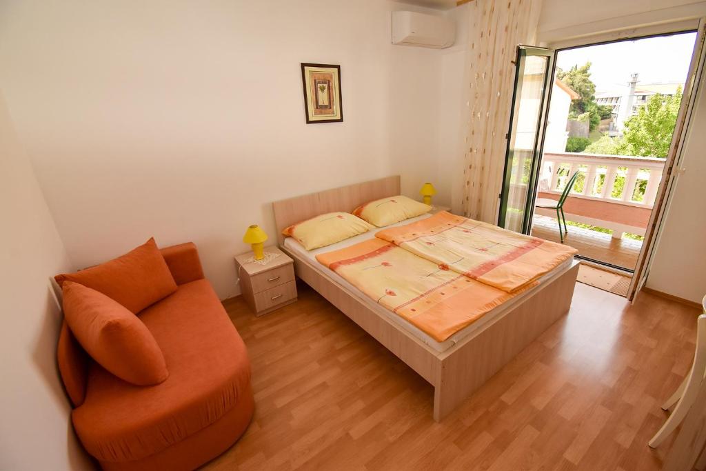 Postel nebo postele na pokoji v ubytování Rooms Anđela
