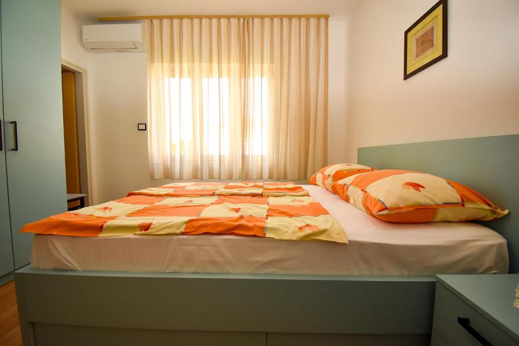 Postel nebo postele na pokoji v ubytování Rooms Anđela