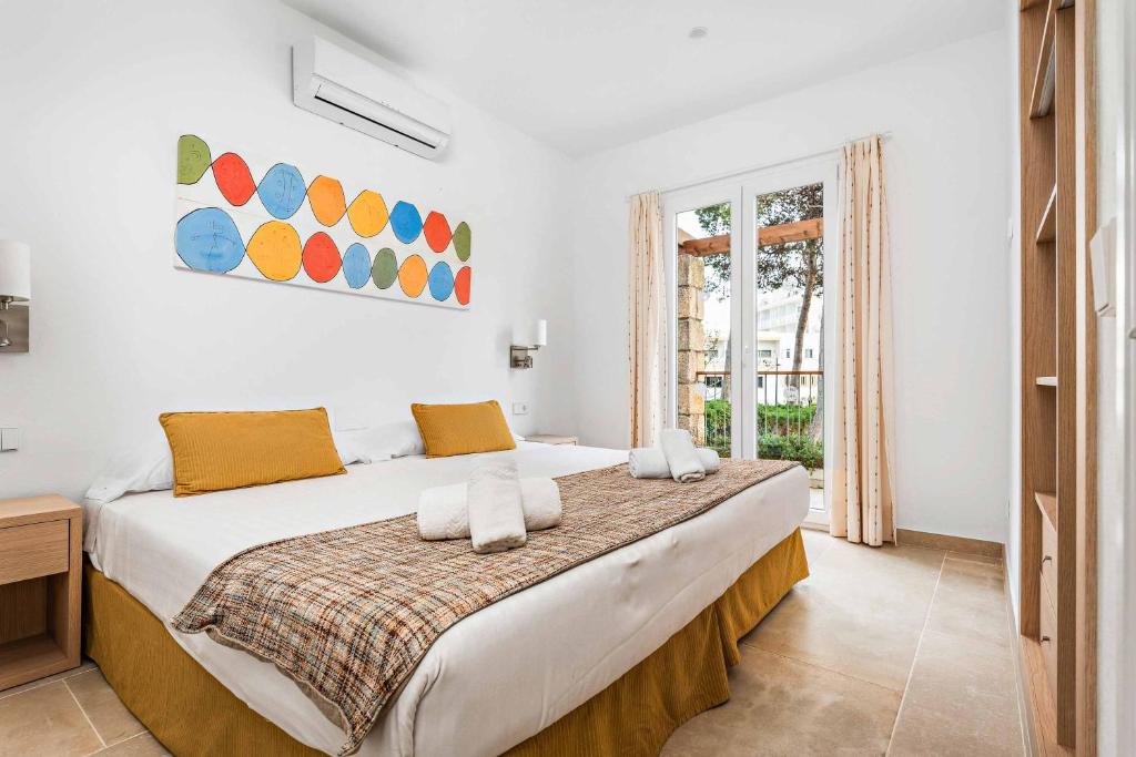 Postel nebo postele na pokoji v ubytování Villa Gabriela