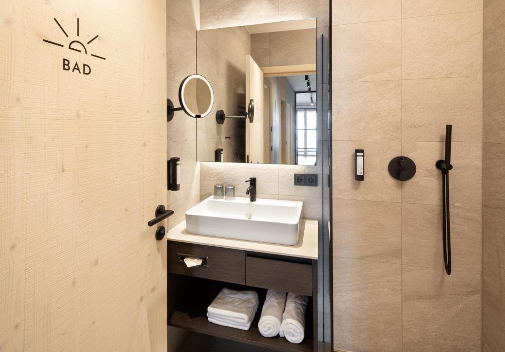 Kúpeľňa v ubytovaní Apparthotel Sonne