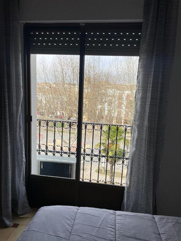 Postel nebo postele na pokoji v ubytování APARTAMENTOS LEONOR