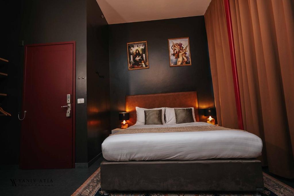 Postel nebo postele na pokoji v ubytování INTA Hotel