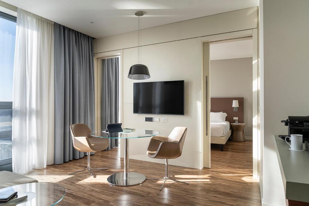 TV a/nebo společenská místnost v ubytování MOVE Hotels Venezia Nord