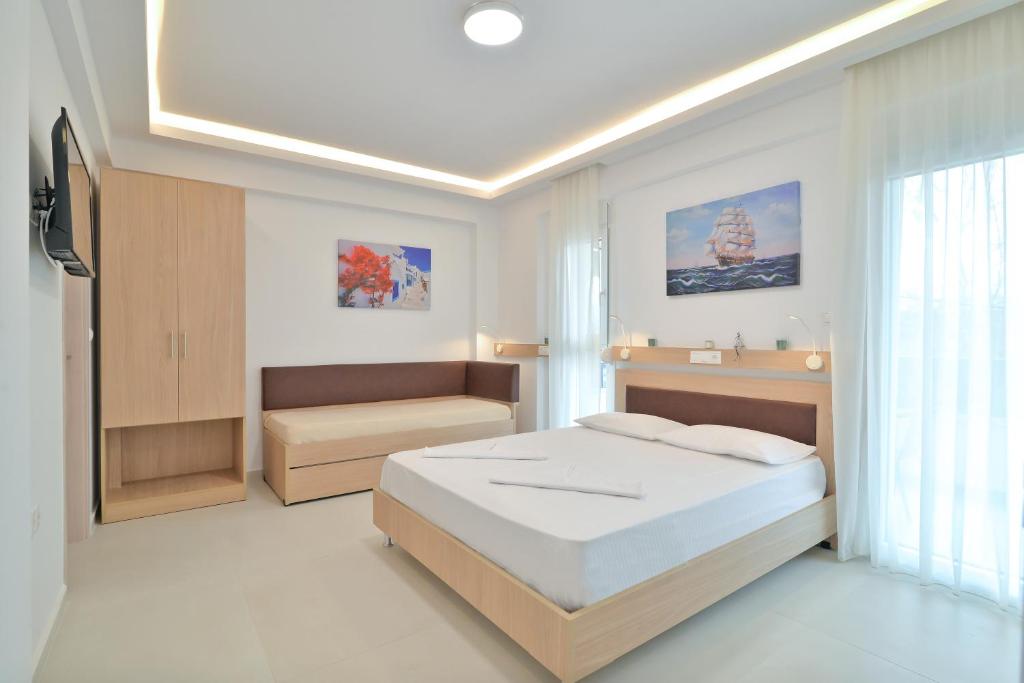 Fotografie z fotogalerie ubytování Evas Rooms v destinaci Néoi Póroi