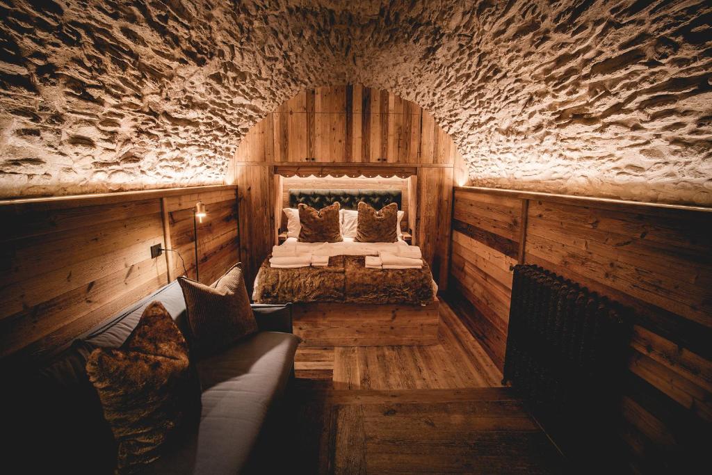 Rúm í herbergi á Chalet Cime Bianche