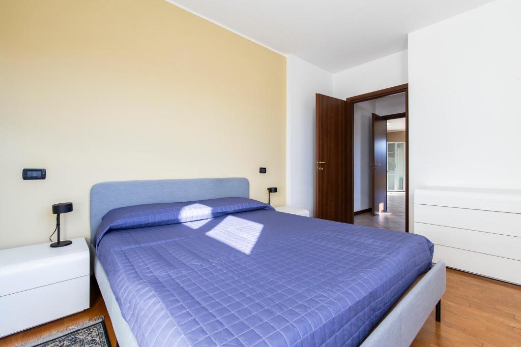 Postel nebo postele na pokoji v ubytování Legnano 20