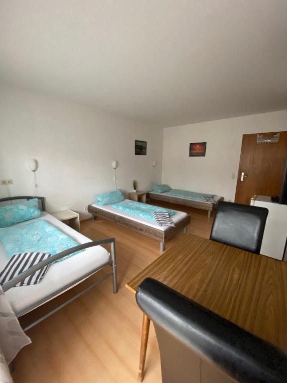 Postel nebo postele na pokoji v ubytování Monteurzimmer - Karlsbad