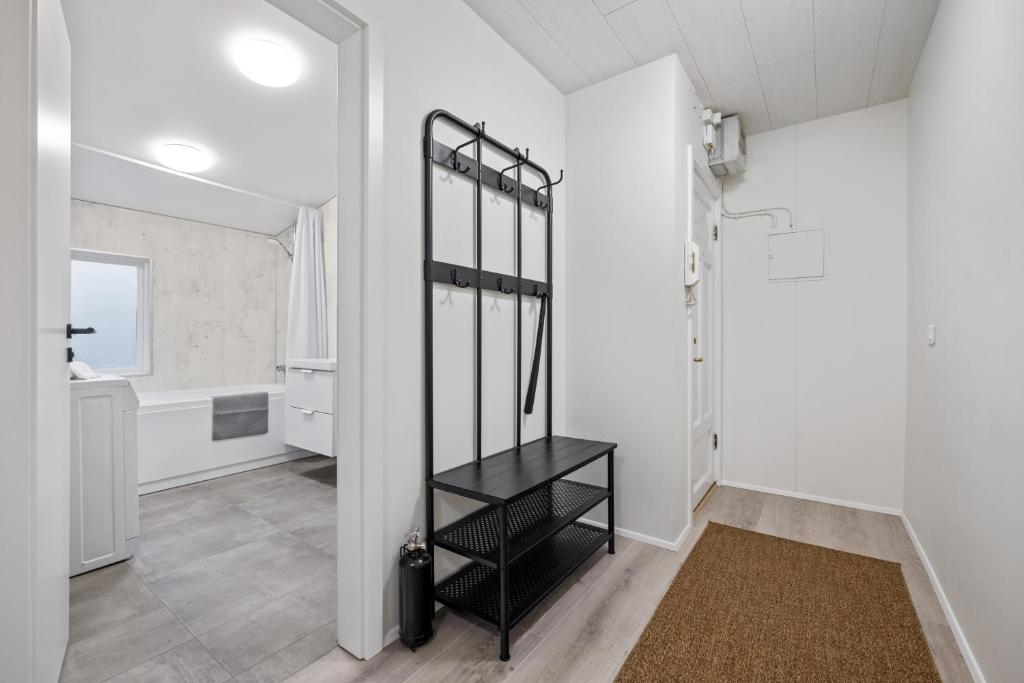 Postel nebo postele na pokoji v ubytování Best Possible Location-Laugavegur Luxury Loft