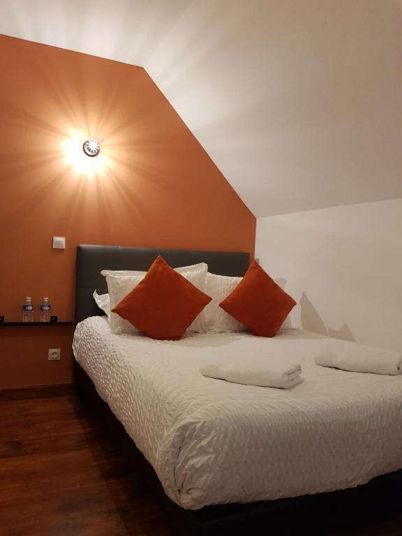 Postel nebo postele na pokoji v ubytování chambres et gites d'étretat
