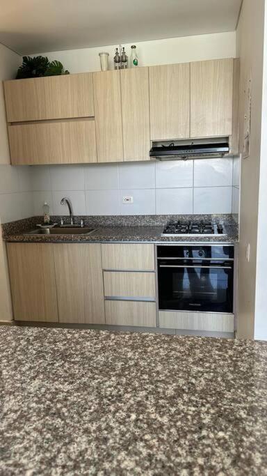 Cucina o angolo cottura di Hermoso Apto con excelente ubicación