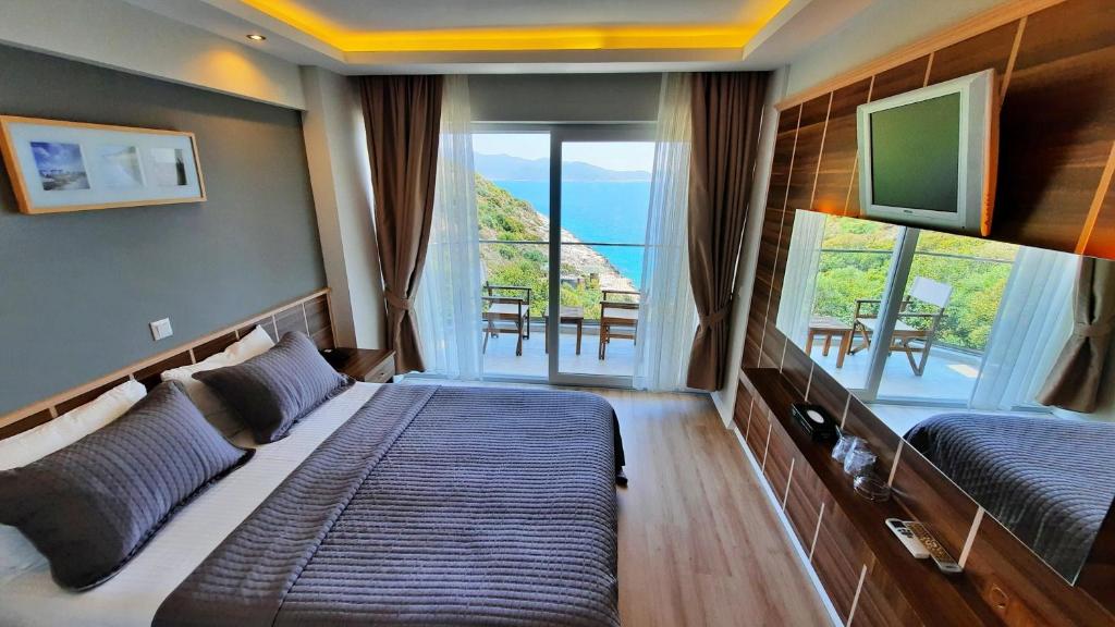Katil atau katil-katil dalam bilik di Aquarius Hotel