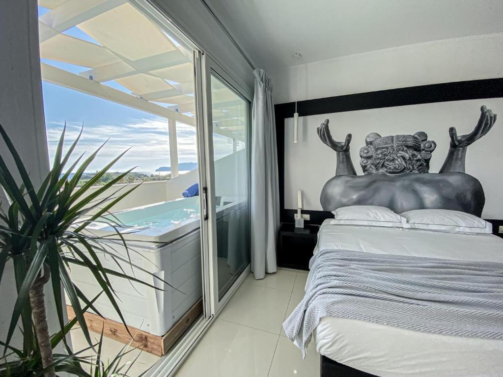 Een bed of bedden in een kamer bij Meandros Boutique & Spa Hotel - Adults Only