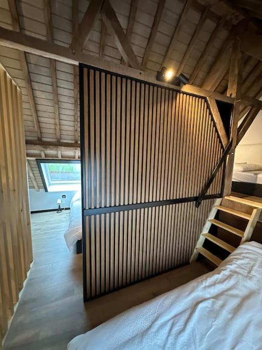 Postel nebo postele na pokoji v ubytování Gîte du Fenil