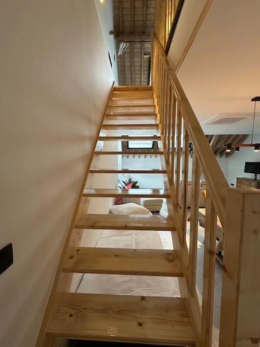 Palanda nebo palandy na pokoji v ubytování Gîte du Fenil