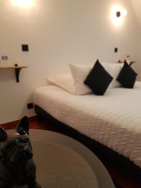 Postel nebo postele na pokoji v ubytování chambres et gites d'étretat