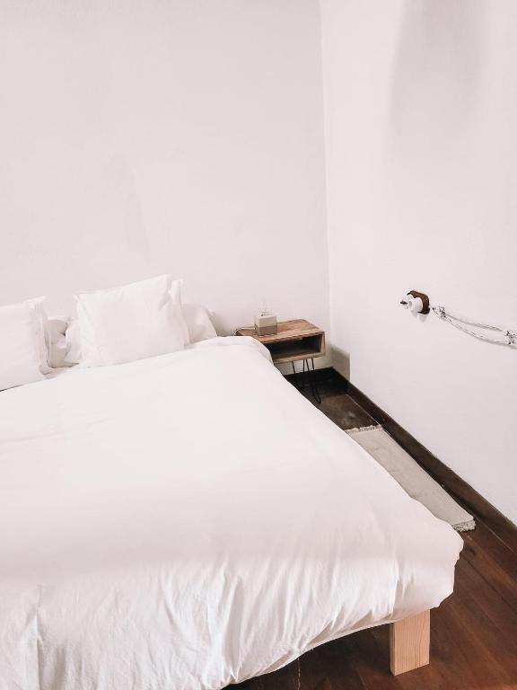 Postel nebo postele na pokoji v ubytování Casa Om