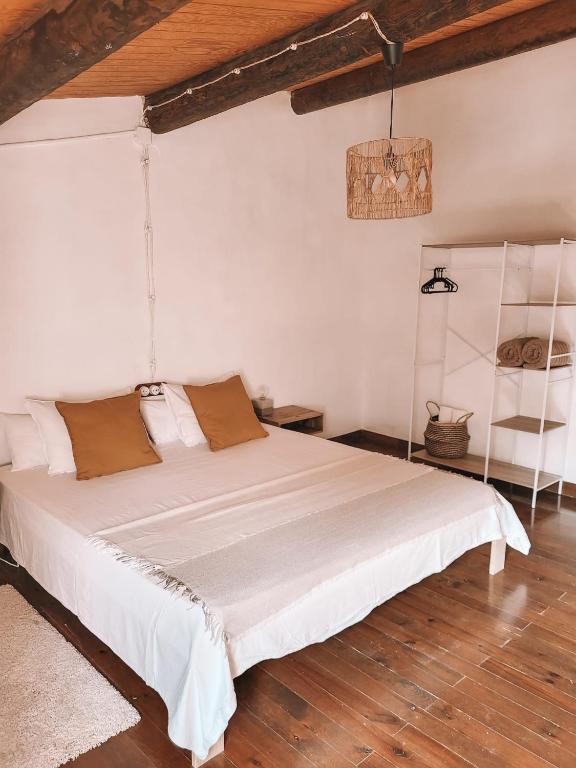 Postel nebo postele na pokoji v ubytování Casa Om
