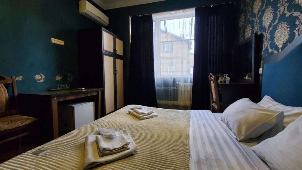 Postel nebo postele na pokoji v ubytování Hotel Antalia