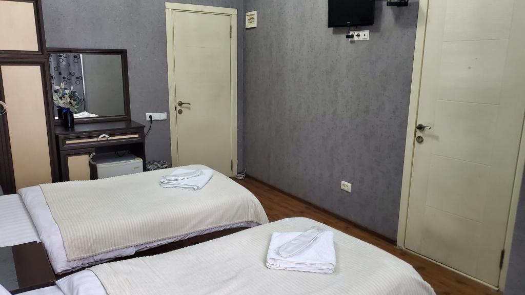 Postel nebo postele na pokoji v ubytování Hotel Antalia