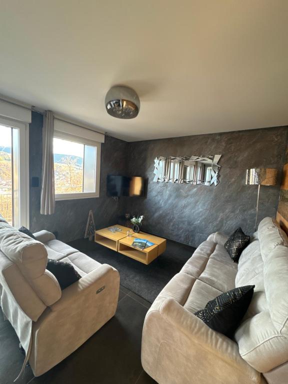 Posedenie v ubytovaní La reine appartement pour deux personnes avec magnifique vue et jacuzzi