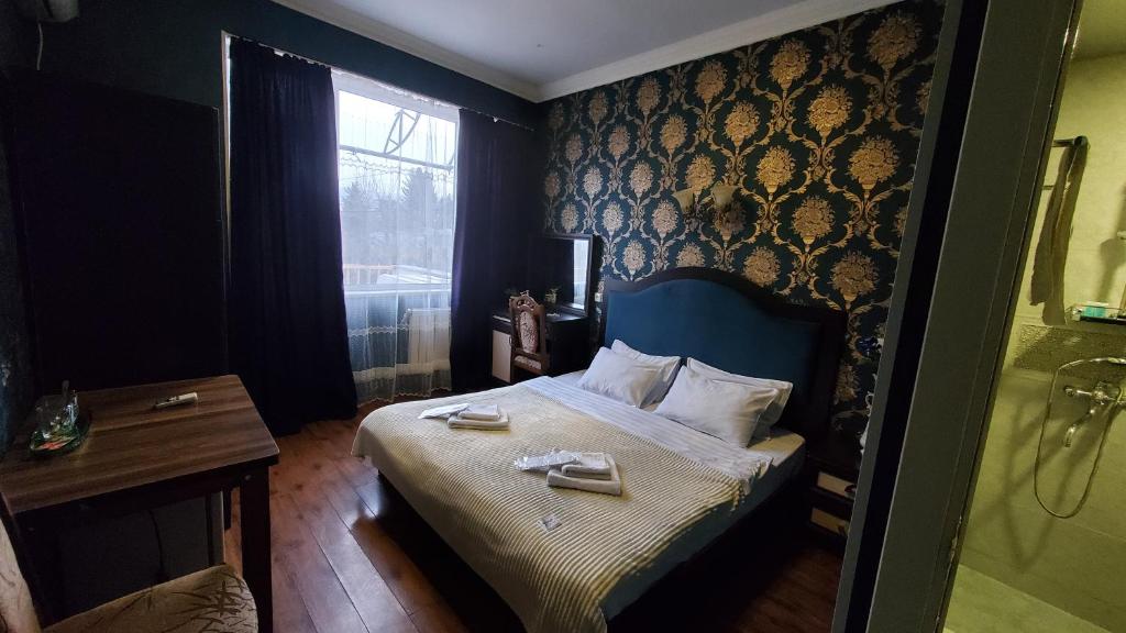 Postel nebo postele na pokoji v ubytování Hotel Antalia