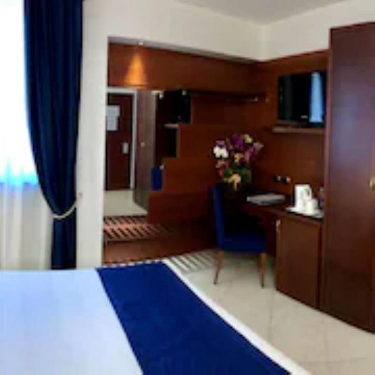 Postel nebo postele na pokoji v ubytování Best Western Hotel Nettuno