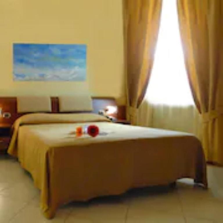 Postel nebo postele na pokoji v ubytování Best Western Hotel Nettuno