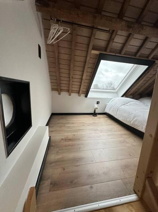 TV a/nebo společenská místnost v ubytování Gîte de la vieille grange
