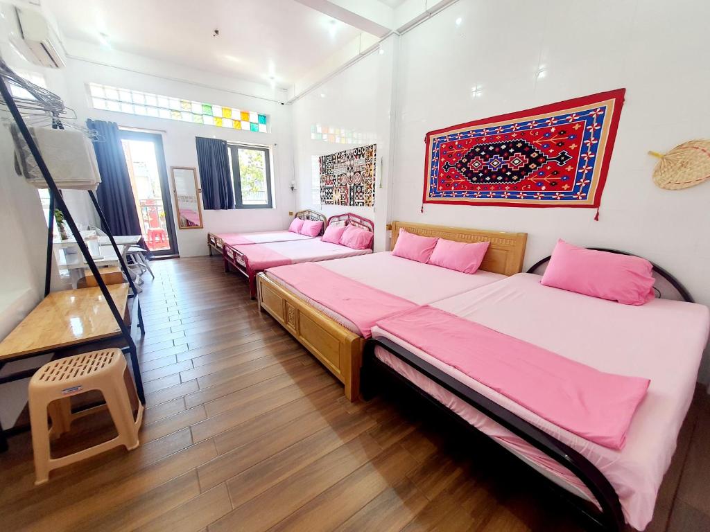 Postel nebo postele na pokoji v ubytování Homestay Khoa Chaudoc