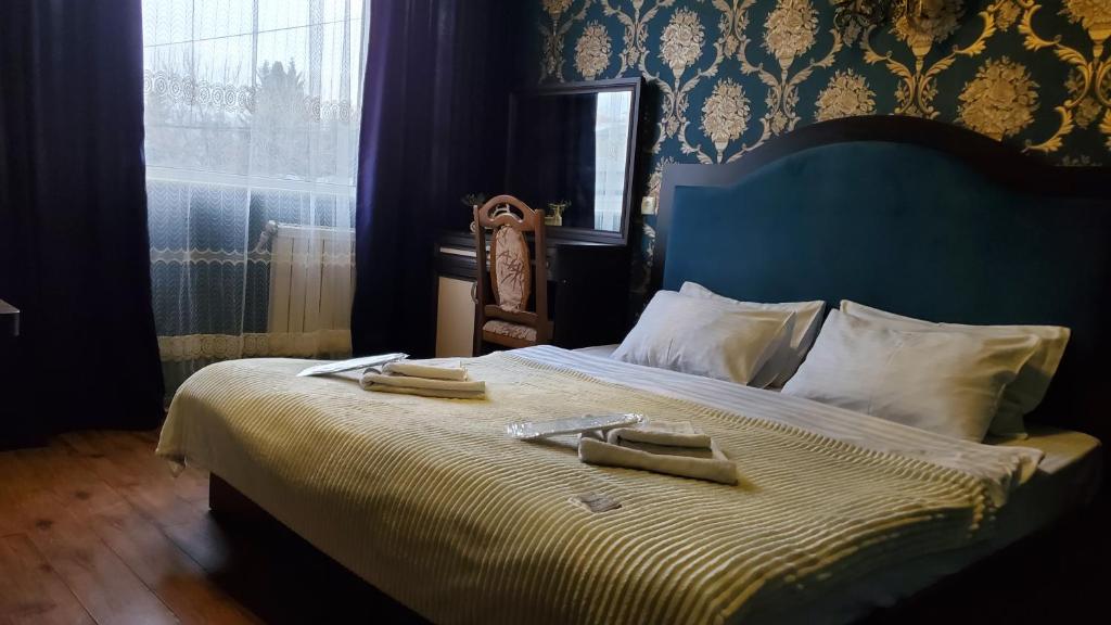 Postel nebo postele na pokoji v ubytování Hotel Antalia
